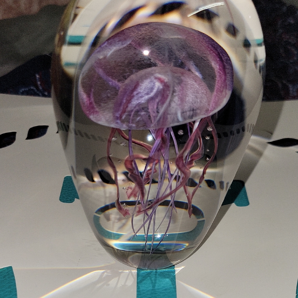 Elegant Glass Paperweight with Purple Jellyfish